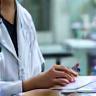 Registered dietitian reviewing scientific journal